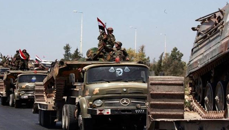 Colonne de véhicules blindés de l'armée syrienne en route vers Quneitra (Al-Hall, 30 mai 2018).