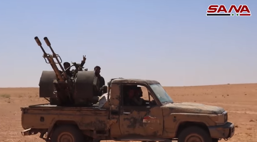 Anti-aircraft gun mounted on a Syrian army vehicle in the area of the T-2 station (SANA, June 20, 2018).