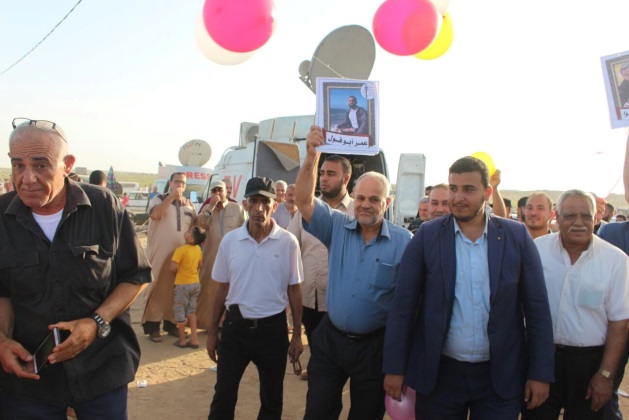 Des responsables du JIP, dont Khaled al-Batash, lancent des ballons avec une photo de Palestiniens tués dans les marches du retour (Page Facebook Sawaed al-Intifada, 24 juin 2018)