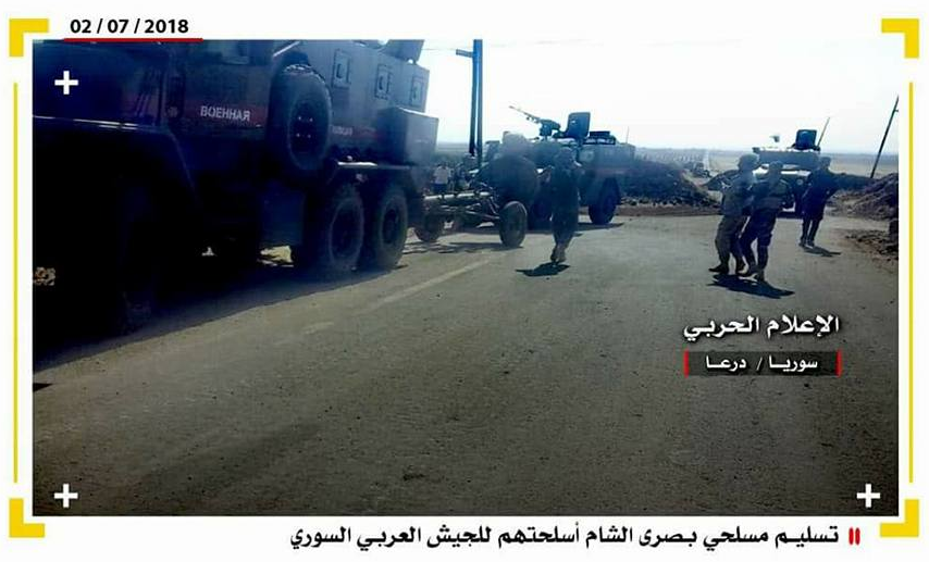 Operatives of the rebel organizations in Basra Al-Sham handing over their weapons to the Syrian army (the Central Information Unit of the Syrian army, July 2, 2018)