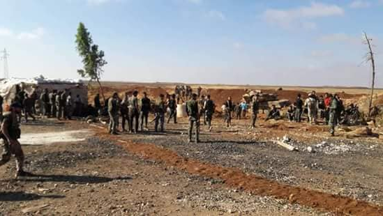 Syrian army and Dhu al-Fiqar Brigade fighters in the area of Busra Al-Harir (Facebook page of the Dhu al-Fiqar Brigade, June 26, 2018).