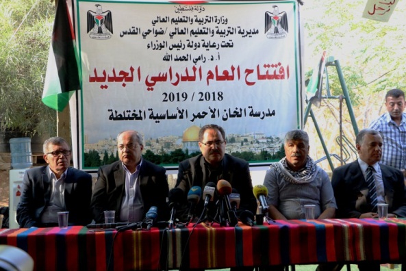 Ceremony for the beginning of the new school year in Khan al-Ahmar under the aegis of Palestinian Prime Minister Rami Hamdallah, with the participation of Sabri Sidam, Palestinian minister of education (Wafa, July 16, 2018).