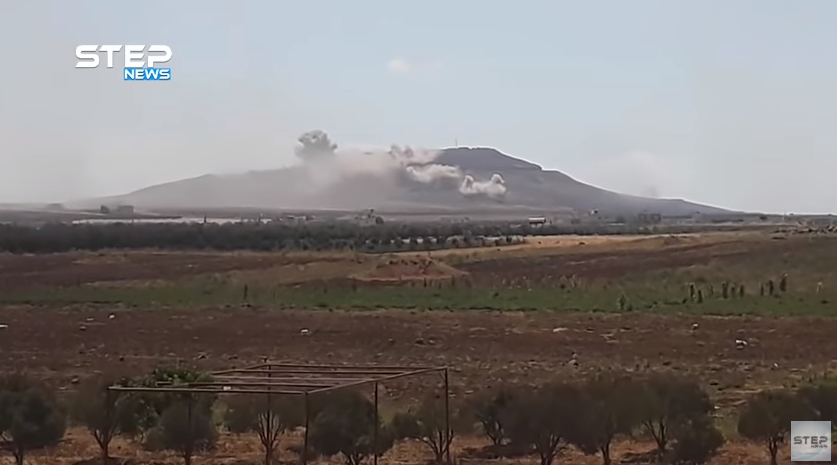 הפצצות וירי ארטילרי של צבא סוריה נגד תל אלג'מוע, שבצפון מזרח מובלעת דאעש (ח'טוה, 23 ביולי 2018).