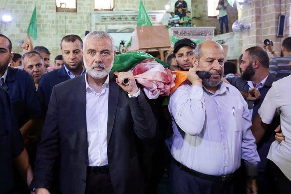 Isma'il Haniyeh, Khalil al-Haya and other senior Hamas figures at the funeral held for the three operatives of Hamas' military wing (Twitter account of Hamas' military wing, July 26, 2018).