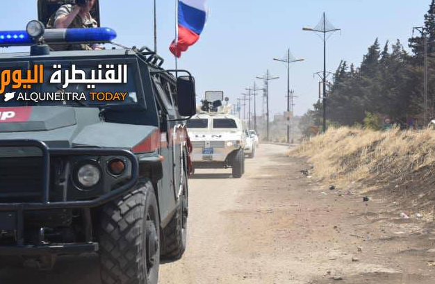 Bullet-proof vehicle of the Russian Military Police leading a convoy of UN vehicles near the Syrian-Israeli border.