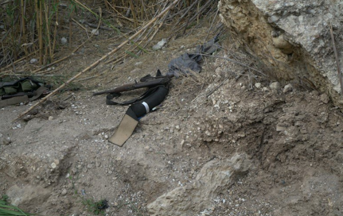 Kalashnikov assault rifles, vest and equipment of ISIS operatives who were killed in the IDF attack (IDF Spokesperson’s Office, August 2, 2018)