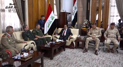 Iraqi Defense Minister Erfan Mahmoud al-Hiyali (in the middle, wearing a suit), during his meeting with the deputy chiefs of staff of Russia, Iran, and Syria (Iraqi Defense Ministry Facebook page, September 1, 2018)