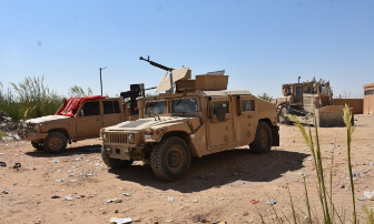 A vehicle and a bulldozer of the SDF forces taking part in the fighting north of Albukamal (SDF Media Center, September 28, 2018)