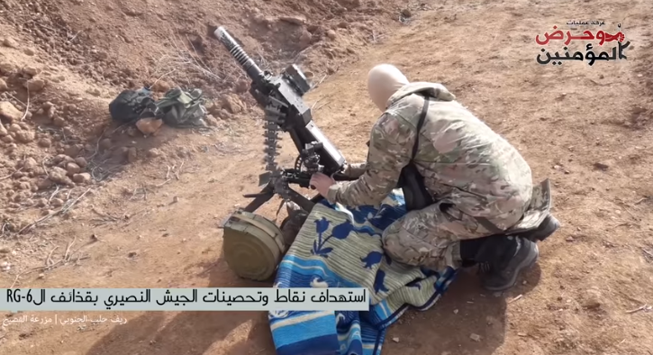 Operative of the operations room “Awaken the Believers” firing at Syrian army positions in the rural area south of Aleppo (“Awaken the Believers” YouTube channel, November 19, 2018)