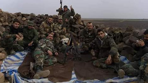 Syrian army soldiers after taking over a dominant hill in the Al-Safa area (Twitter, November 17, 2018). 