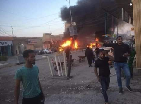 Cars on fire at the scene of the car bomb explosion in central Tikrit (Mohammed Abed Suleman’s Twitter account, November 18, 2018)