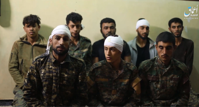 Les prisonniers des SDF apparaissant dans la video (Amaq, 25 novembre 2018)