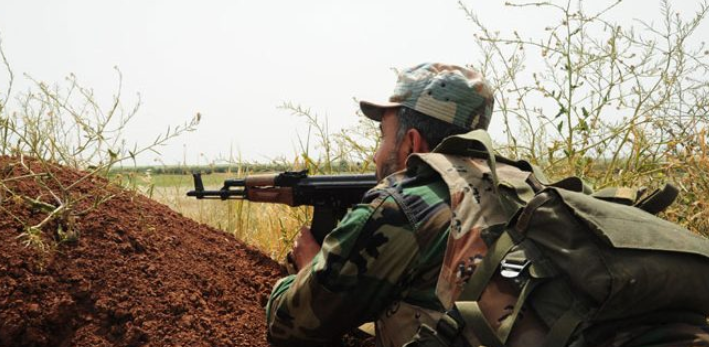 Syrian army soldier at a firing position in the rural area north of Hama (SANA, December 1, 2018)