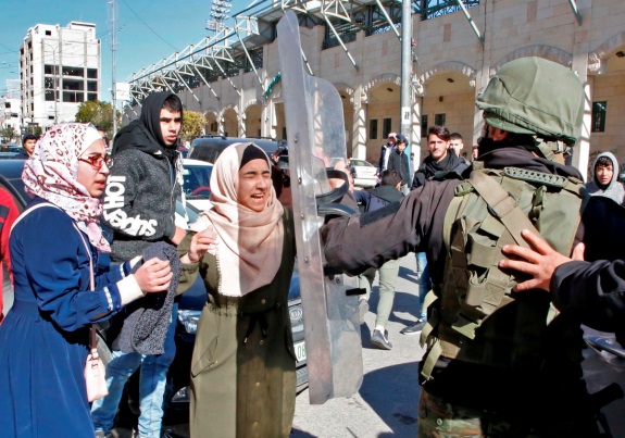 Suppressing the Hamas parades in Hebron. 