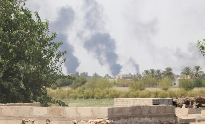 Smoke clouds after Coalition airstrikes in the city of Hajin (SDF Press, December 20, 2018).