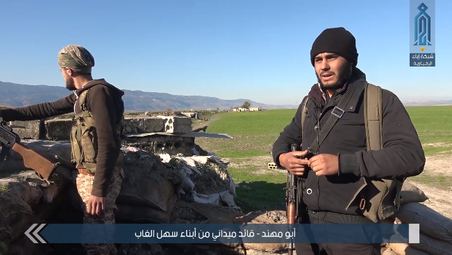 Operatives of the Headquarters for the Liberation of Al-Sham at a fighting position against the Syrian army in the Al-Ghab Plain (Ibaa video, January 19, 2019)