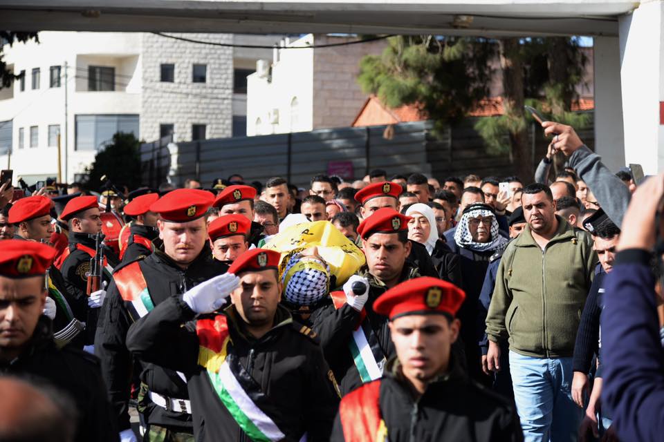 The military funeral held for Ayman Hamed. His body was wrapped in the Fatah flag (Facebook page of Ramallah district governor Laila Ghanem, January 26, 2019).