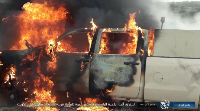 Vehicle of the Iraqi security forces on fire after an IED was detonated against it (Shabakat Shumukh, February 14, 2019)