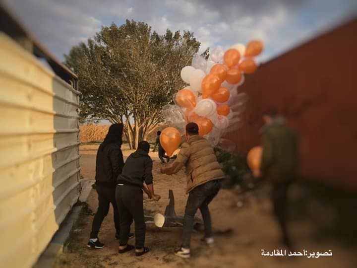  Preparing and launching a cluster of balloons with an incendiary device attached. It was flown into Israeli territory east of al-Bureij ("sons of al-Zouari in Rafah" Facebook page, February 20, 2019).