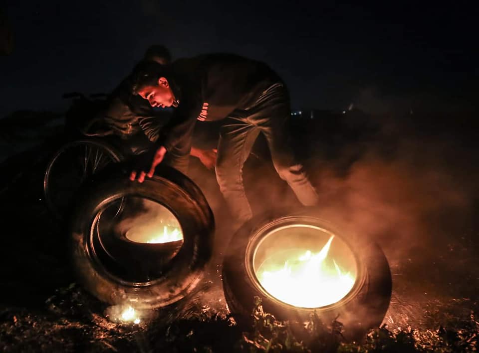 The night harassment unit burns tires in eastern Gaza City.