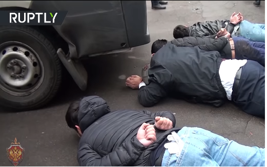  Picture from the video, showing operatives of the squad immediately after their detention (Russia Today YouTube page, October 26, 2018)