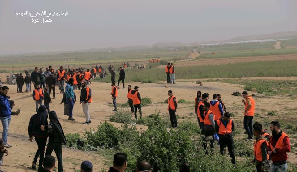 Operatives of Hamas' security forces, wearing orange vests, deploy in the northern Gaza Strip (Palinfo Twitter account, March 31, 2019).