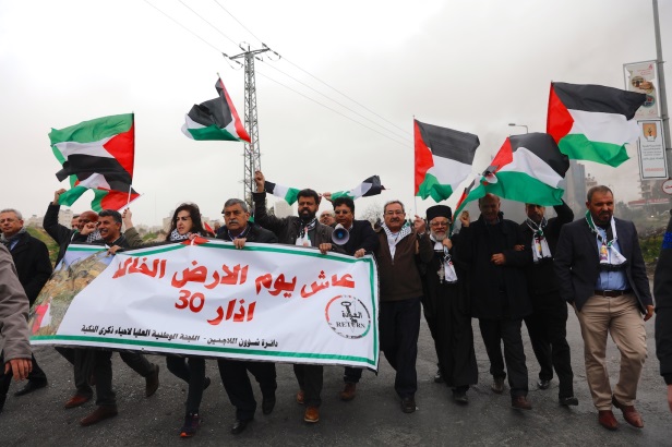 Mustafa Barghouti (far left) at the march (Wafa, March 30, 2019). 