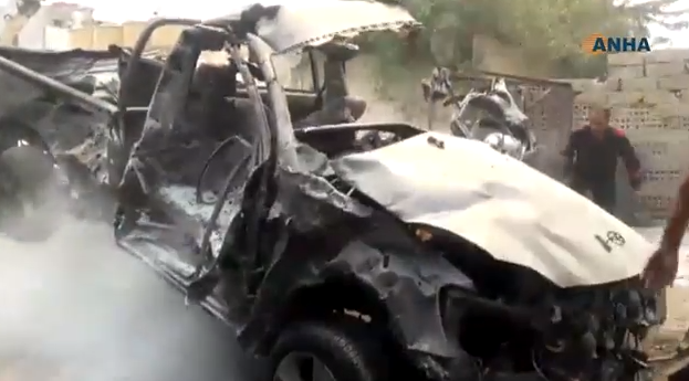 One of the vehicles which were destroyed in the explosion of the car bomb near the Kurdish internal security headquarters. 