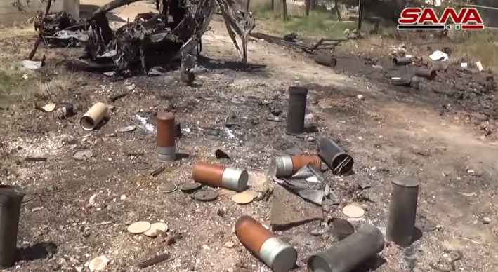 Véhicule rebelle détruit par l'armée syrienne sur la route reliant Al-Hamamiyat à Al-Jubain (SANA, 13 juin 2019).