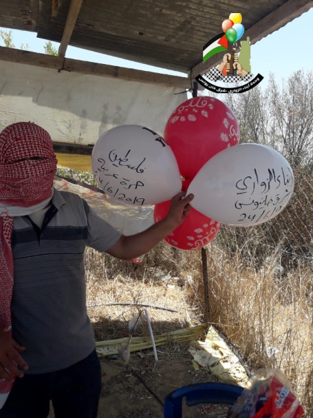 The Sons of al-Zawari, eastern Khan Yunis unit, launch incendiary balloons into Israel on June 24, 2019 (Sons of al-Zawari, eastern Khan Yunis' Facebook page, June 24, 2019).