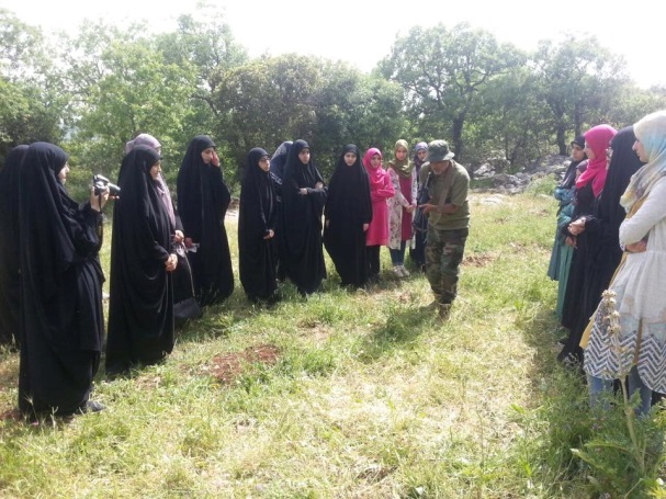 Hezbollah fighter meets with female activists of the Education Mobilization in southern Lebanon as part of a “jihadi trip.” The trip included visits at the grave of a shahid and a Hezbollah post. During the visit, the fighter talked with them about “jihadi spirit” and the virtues of Sayyida Zaynab (the daughter of Imam Ali and Fatima, the Prophet Muhammad’s daughter, revered by the Shiites) and the connection with Imam Al-Mahdi (Facebook page of the Education Mobilization, The Second Region [in southern Lebanon], May 4, 2016)