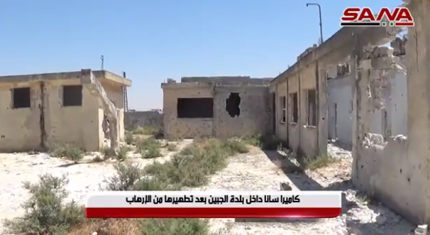 Buildings hit in Al-Jebeen, which was retaken by the Syrian army on July 29, 2019. The Arabic caption reads, “SANA’s camera inside the village of Tal Mileh after it was liberated from terrorism” (SANA, July 30, 2019). The buildings show considerable damage from metal pellets. In the ITIC's assessment, the damage may have been caused by the airstrikes, in which large quantities of such pellets may have been used.