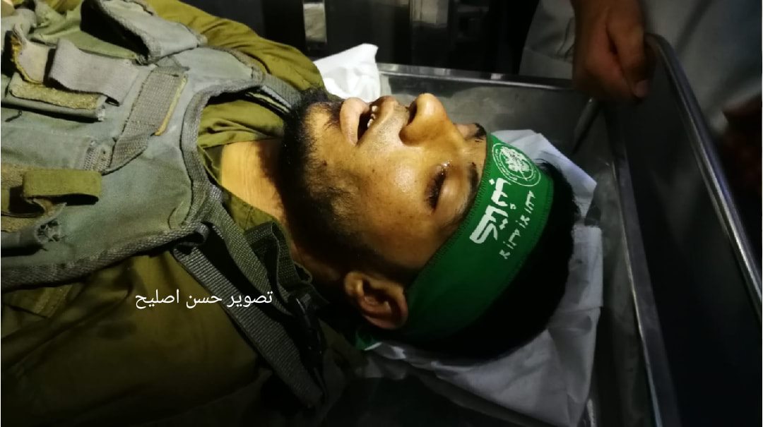 The body of Marwan Nasser with a green Hamas headband (Facebook page of journalist Hassan Aslih, August 11, 2019).