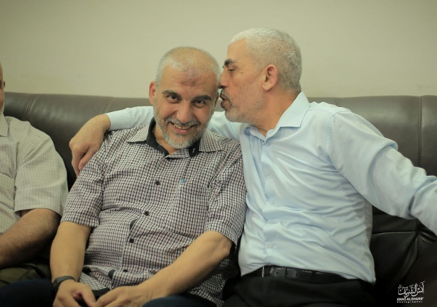  Picture posted to the social networks of Yahya al-Sinwar and Abu Anas al-Ghandour, a senior figure in Hamas' military wing who usually does not appear in the media (Facebook page of journalist Anas al-Sharif, August 15, 2019). The picture was apparently taken during a visit the two made as part of the camp to visit members of the Armilat tribe in the northern Gaza Strip.