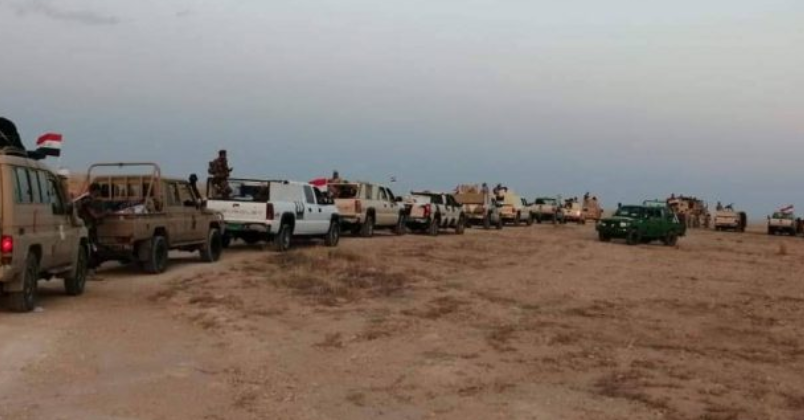 Mounted Popular Mobilization and Iraqi army force in a desert area during the security operation (al-hashed.net, August 25, 2019)