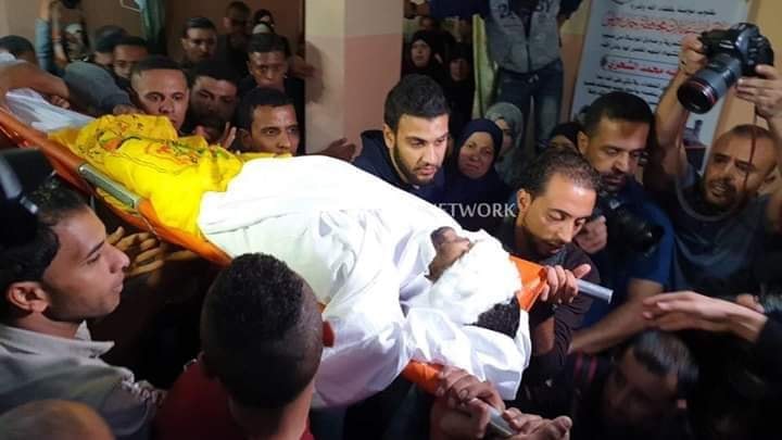 The funeral held for Ahmed Muhammad al-Shahari, his body draped with a Fatah flag (Facebook page of the information department of the Fatah branch in western Khan Yunis, November 2, 2019).