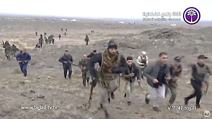 Popular Mobilization fighters searching the mountainous region in the Diyala Province (from the Iraqi Baladi TV channel, December 10, 2019).