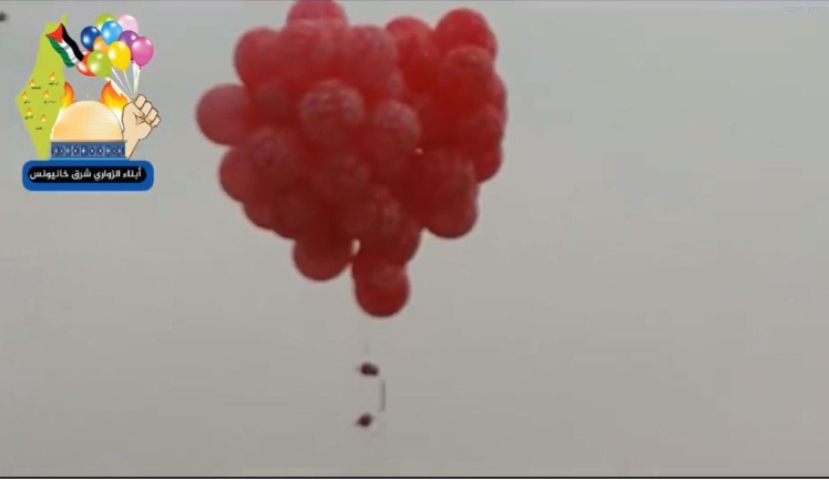 A picture from a video posted to the Facebook page of the Sons of al-Zawari unit in eastern Khan Yunis. They wrote that they were continuing to launch incendiary and IED balloons into the 