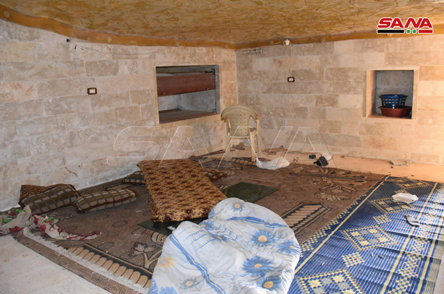 Underground space which apparently had been used by rebel operatives as sleeping quarters in Tillat al-Nar, southwest of Maarat Nu'man (SANA, February 25, 2020)