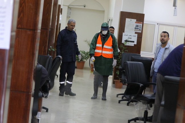 Disinfecting the Gaza Strip city hall (Facebook page of the Gaza Strip city hall, March 9, 2020).