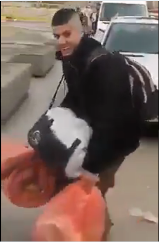 Palestinian workers carry personal belongings for an extended stay in Israel (Palinfo Twitter account, March 18, 2020). 