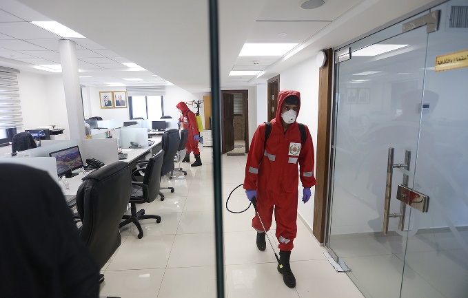 Disinfecting media offices in Ramallah, including the offices of the Wafa news agency (Wafa, April 2, 2020).