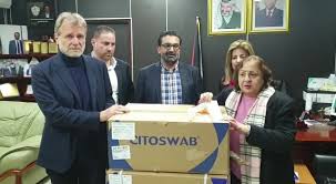 The health minister announcing the transfer of the swabs to the Gaza Strip (Facebook page of the Palestinian Authority Health Ministry, April 1, 2020)