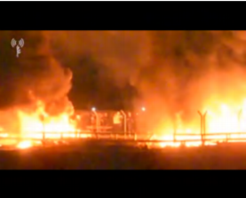 Rioters burn the gas pipes on the Palestinian side of the Kerem Shalom Crossing (IDF spokesman, May 12, 2018). 