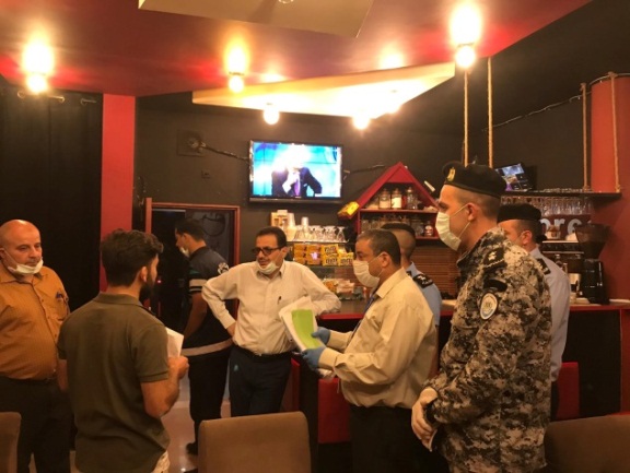 The governor of the Qalqilya district visits one of the bagrut examination rooms in Azoun Atmeh (Facebook page of the Qalqilya district governor, June 5, 2020).