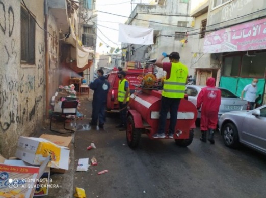 Disinfecting the al-Om'ari refugee camp (Palestinian civil defense Facebook page, July 18, 2020).