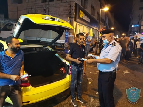 Palestinian police distribute masks to Bethlehem residents (Palestinian police website, July 30, 2020).