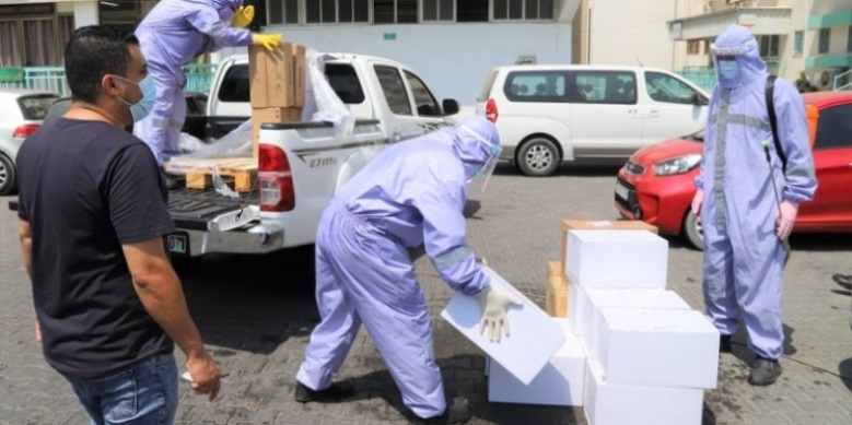 A PCR machine and swabs donated by Qatar's National Committee for the Reconstruction of Gaza (Committee website, September 1, 2020).