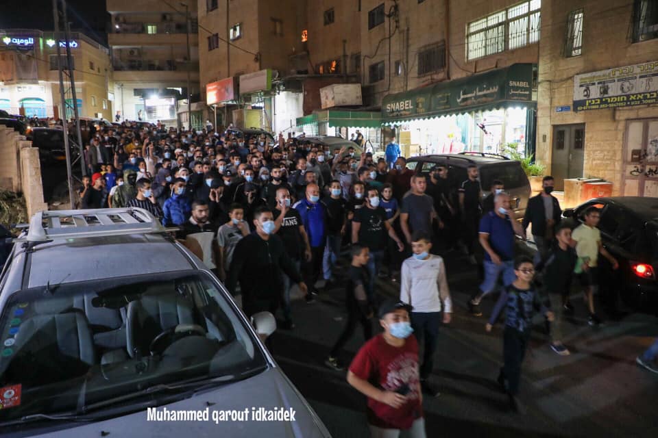 Parade held in the Sur Baher neighborhood of east Jerusalem to mark Muhammad's birthday. Masks, no social distancing (Facebook page of east Jerusalem photojournalist Muhammad Qarout Idkaidek, October 29, 2020).