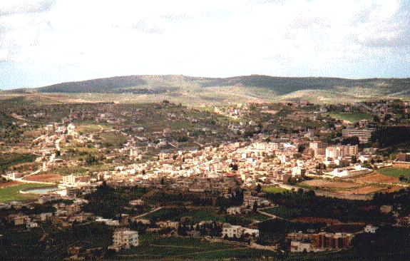 Overview of the city of Bint Jbeil (photo from 2002) (Arabic Wikipedia entry on “Bint Jbeil”)